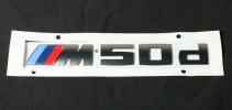 Эмблема M50d